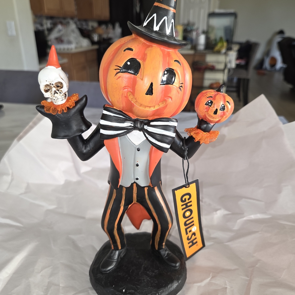 Ghoulish Pumpkin Figurine with Skull